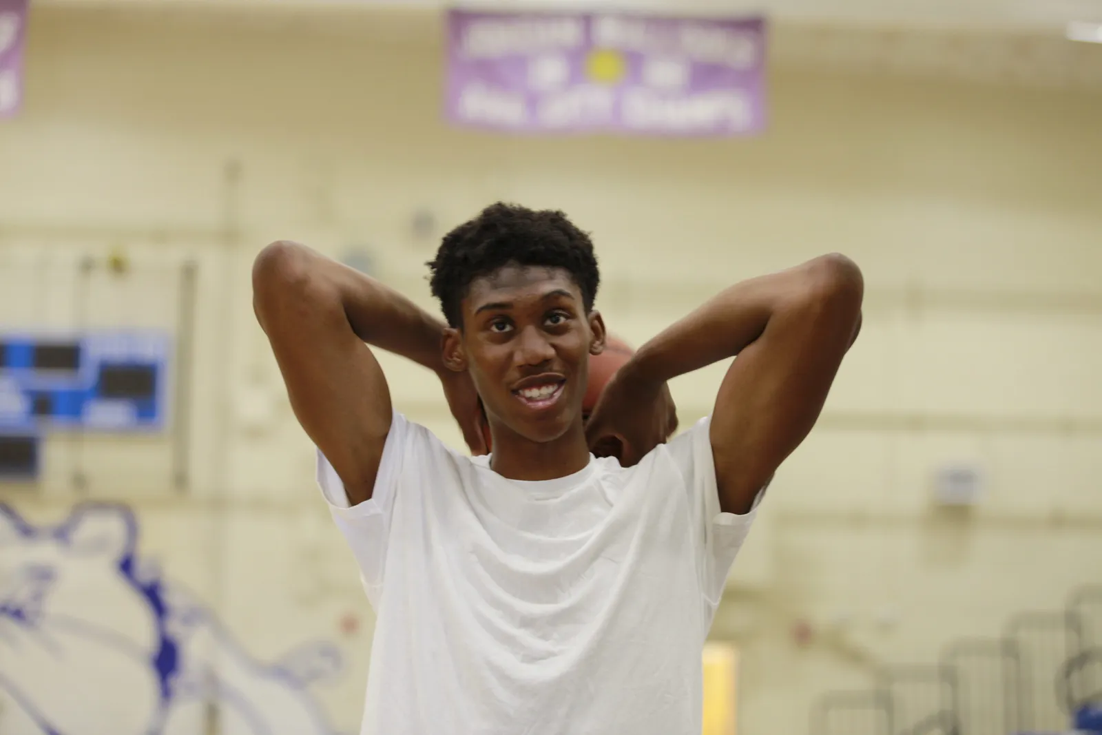 Tyrone Riley Jr. with basketball at Jordan High